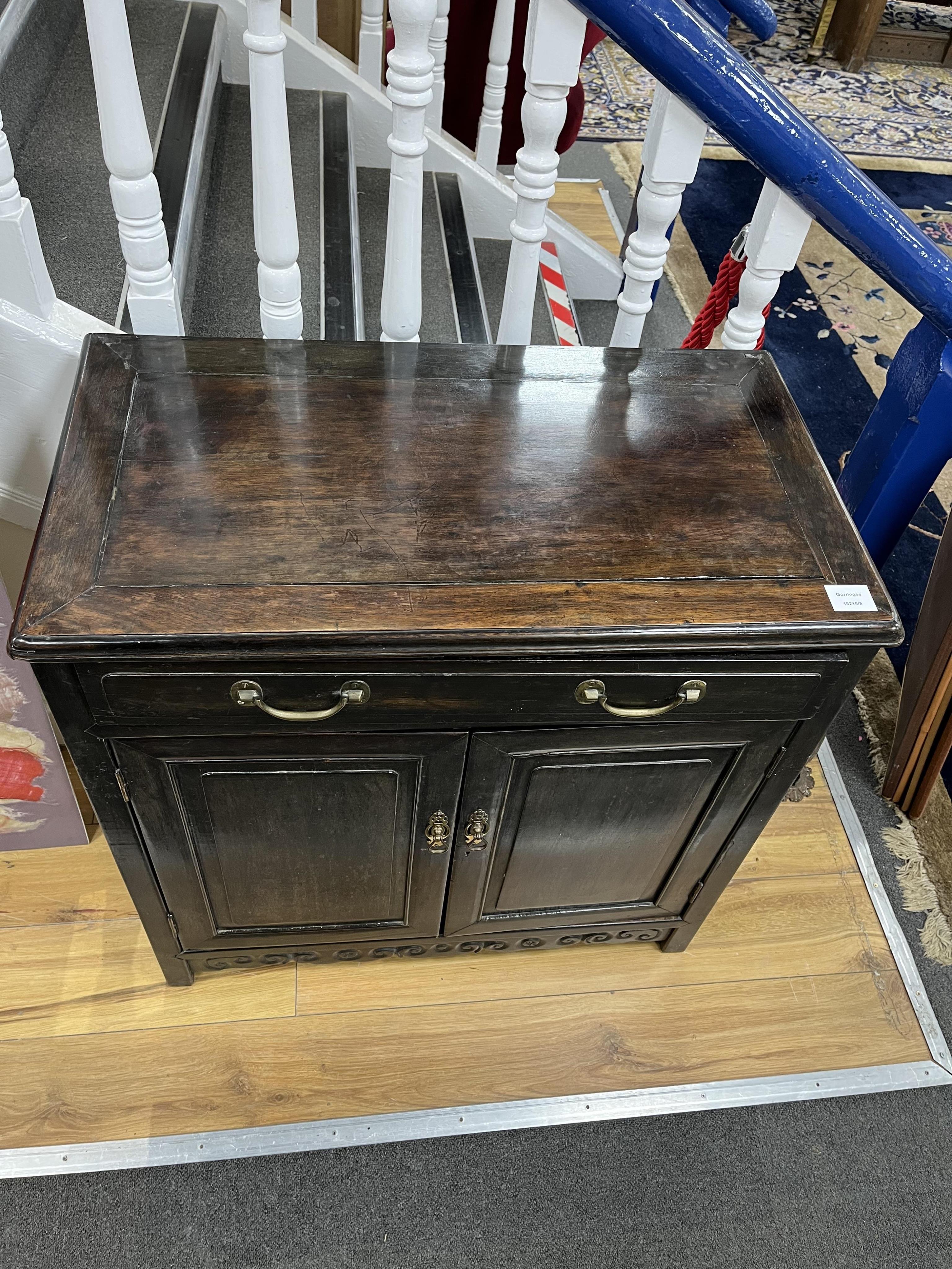 A Chinese hardwood low cabinet, width 77cm, depth 42cm, height 77cm. Condition - fair